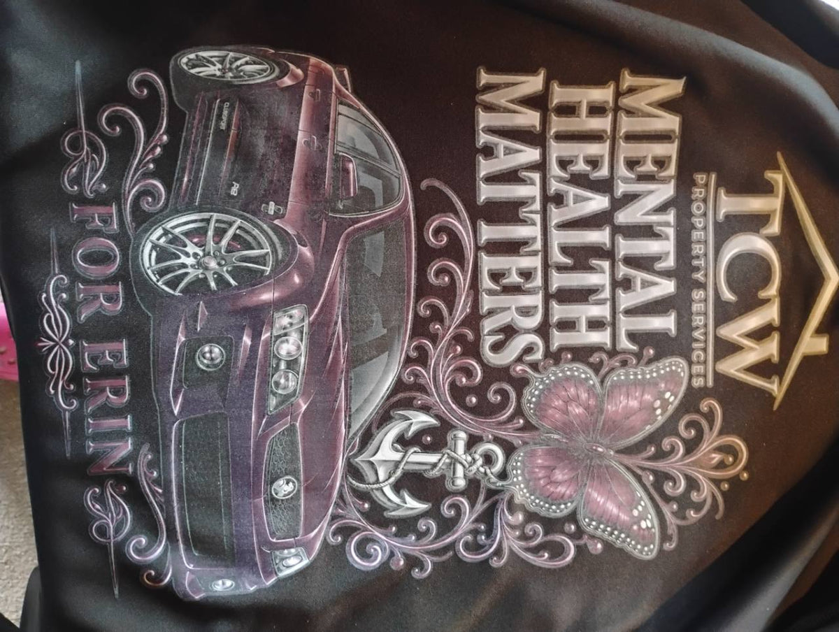 Close-up of the For Erin garment print showing the car, butterfly, anchor and Mental Health Matters lettering.