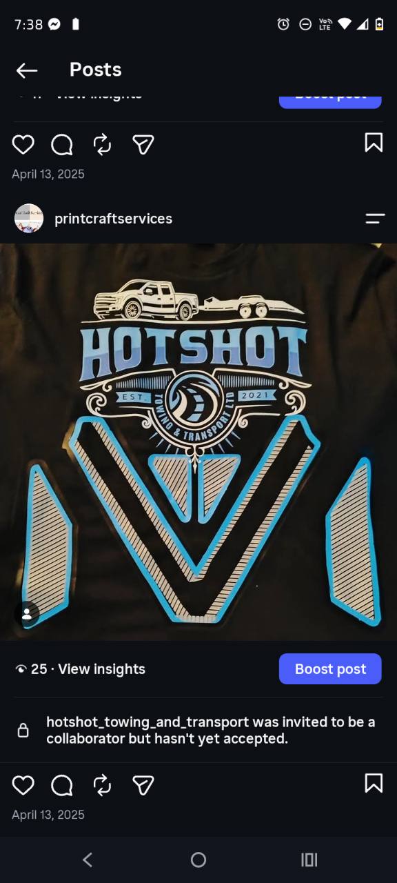 Blue and white Hotshot Towing and Transport artwork on a black garment.